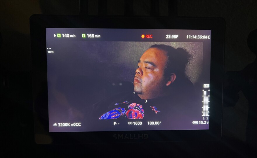 San Diego rap artist "Big June" sits for an interview for "The California Story" in this undated photograph.