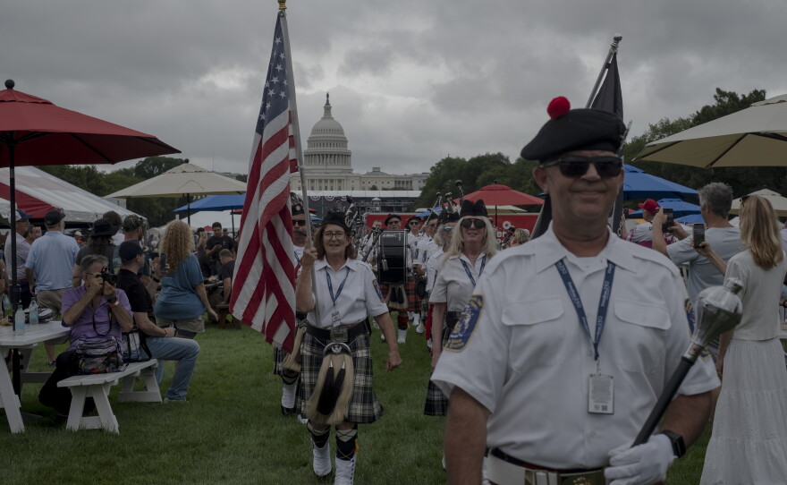 The Indianapolis 500 Gordon Pipers march down the National Mall during the Freedom 250 Grand Prix on August 22, 2026.