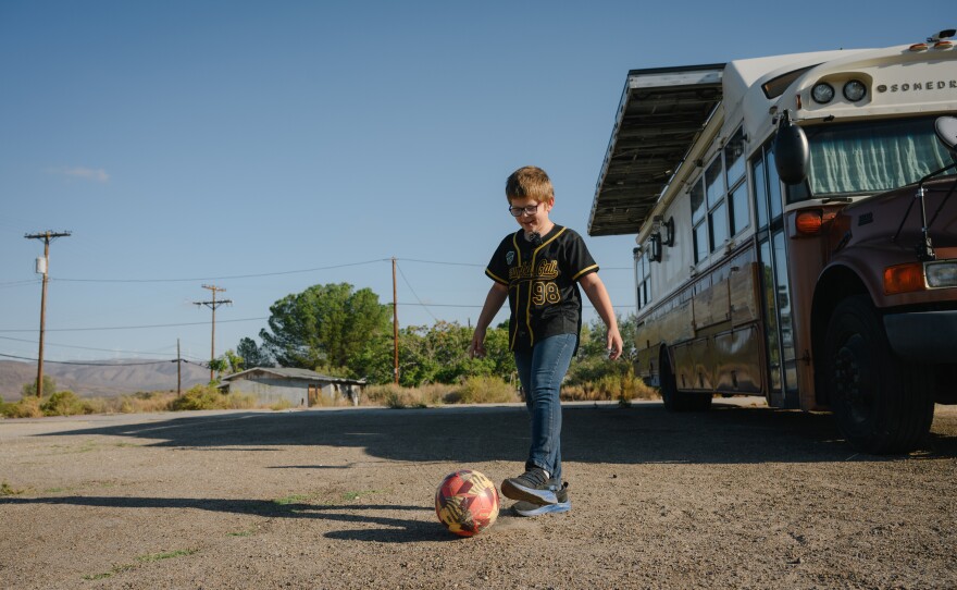Danny Leon Jr. kicks a soccer ball during an interview with KPBS in Jacumba Hot Springs, California, in East County on Sept. 26, 2025.