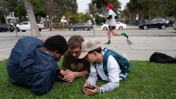 The California Legislature is considering bills to safeguard children from chatbots and curb addictive social media for kids. Students of Saint Monica Preparatory hang out after school in Santa Monica. May 24, 2023.