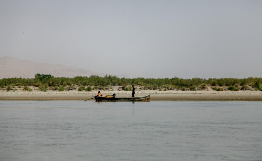 Fishermen seek their catch down a stretch of the Indus River near the southern Pakistani town of Sehwan.