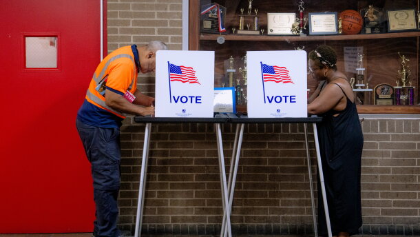 People vote in the primary election at Northwestern High School in Detroit, Tuesday.