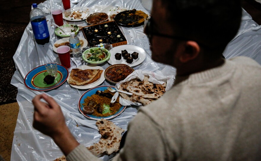 Hadwan Hadwan, 22, finishing off lunch.