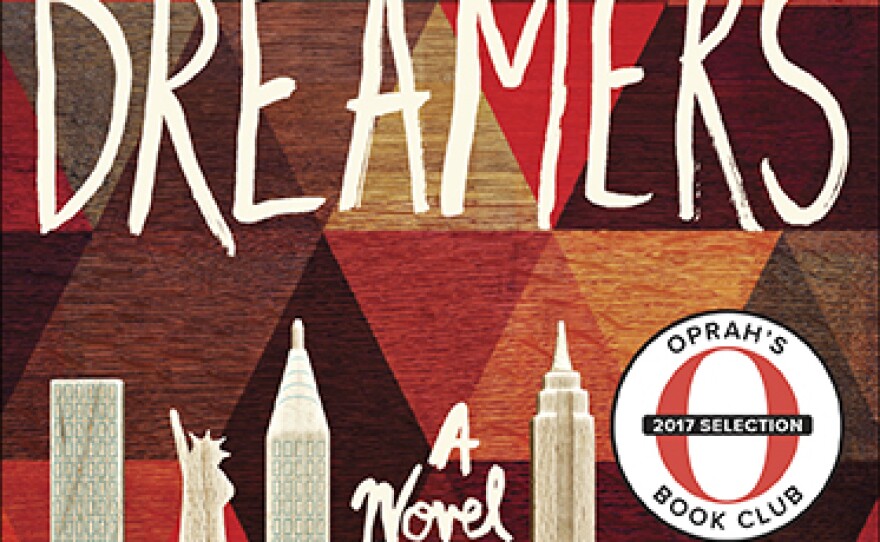 The book cover for the paperback edition of 'Behold the Dreamers' by Imbolo Mbue, published June 26, 2017.