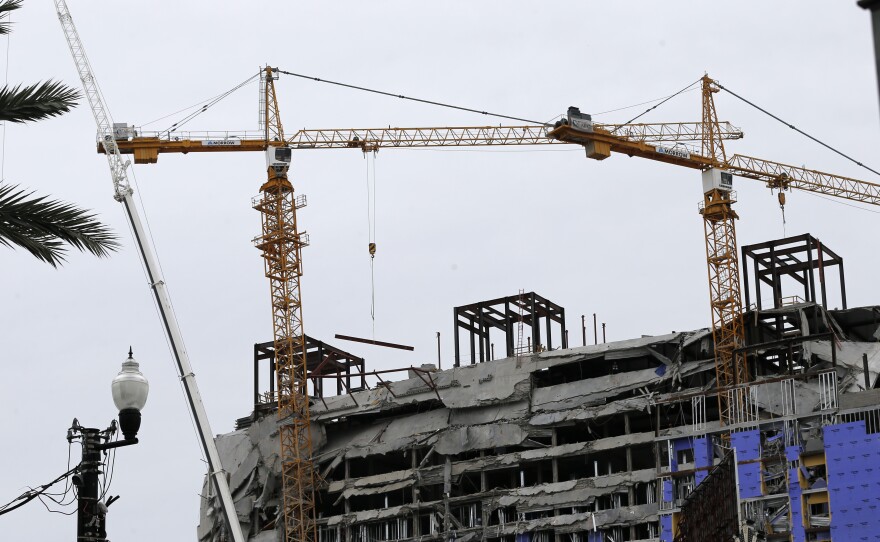 The two unstable cranes at the Hard Rock Hotel collapse site will be brought down by a controlled explosion.