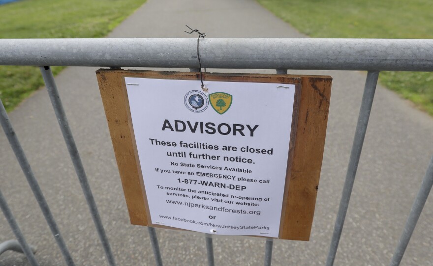 A sign at the barricaded Liberty State Park in Jersey City turns away would-be visitors during the New Jersey government shutdown.