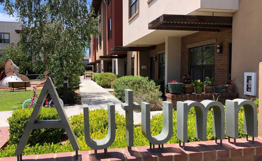 A sign at the Autumn Terrace Apartments in San Marcos owned by affordable housing developer Ginger Hitzke, June 9, 2021.