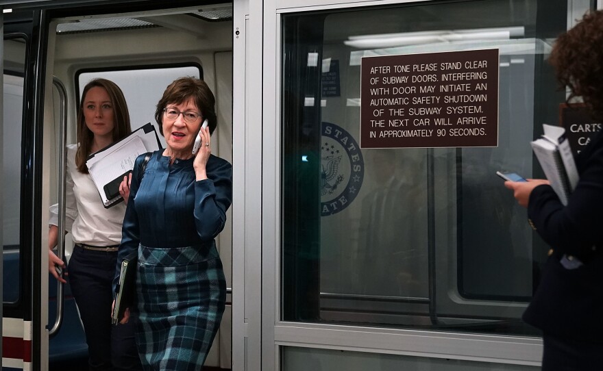 Sen. Susan Collins of Maine steps off the Senate subway. She is one of the key potential votes on taxes and has expressed some concerns.