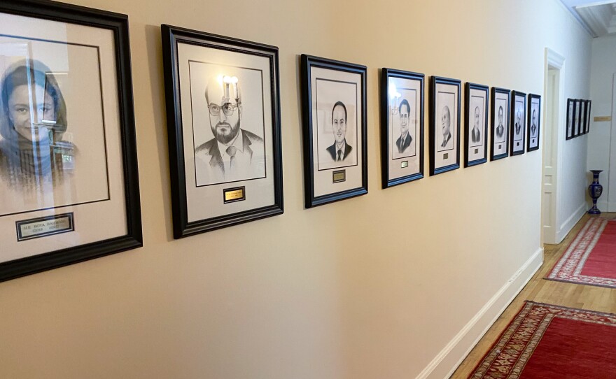 In a long hallway at the Afghan embassy, a dozen portraits of former ambassadors line the walls in order of the years they served. The portraits skip the years between 1981 and 2002, a gap that includes the previous time the Taliban was in power.