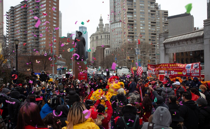 Confetti rains down a celebration organized by Better Chinatown USA in American Legion Kimlau Memorial Square on Friday.