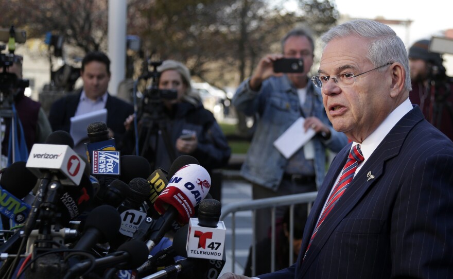 Sen. Bob Menendez, D-N.J., speaks to reporters in front of the courthouse in Newark, N.J., on Nov. 16, 2017. The federal bribery trial of Menendez ended in a mistrial when the jury said it was deadlocked on all charges against him.