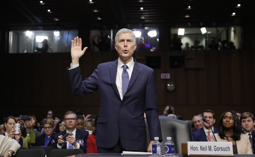 Supreme Court Justice nominee Neil Gorsuch is sworn-in on Capitol Hill in Washington during his confirmation hearing before the Senate Judiciary Committee, March 20, 2017.  