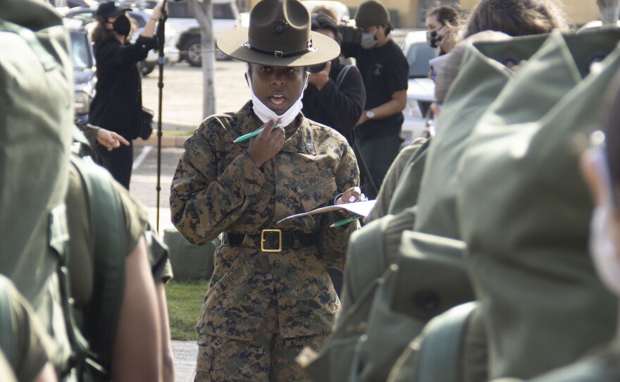Marine Corps drill instructor Sgt. Ayesha Zantt speaks to recruits at Marine Corps Depot San Diego, Feb. 11, 2021.