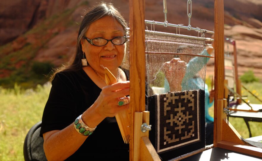 Barbara Teller Ornelas weaving in Canyon de Chelly, N.M.