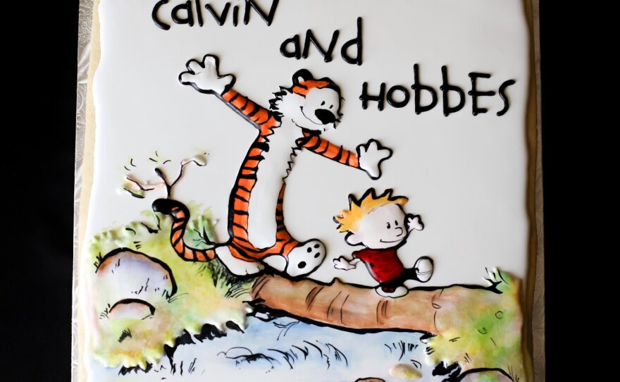 For this cookie of the comic strip characters Calvin & Hobbes, Fitt applied separate layers of icing and then hand painted it with food coloring.