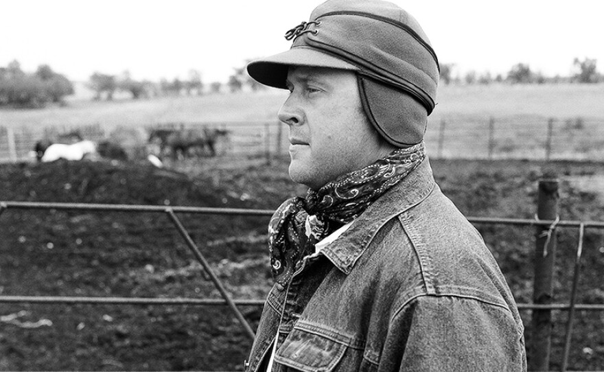 Jed Rider tends to his cows.