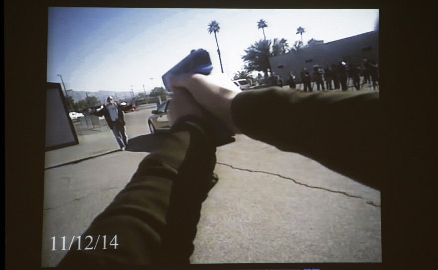 Footage from a Las Vegas Police Department body camera demonstration is projected on a screen in November.