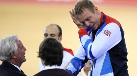 Sir Chris Hoy of Great Britain cries as he celebrates winning the men's keirin track cycling final. In shedding Olympic tears, Hoy was far from alone in Britain.
