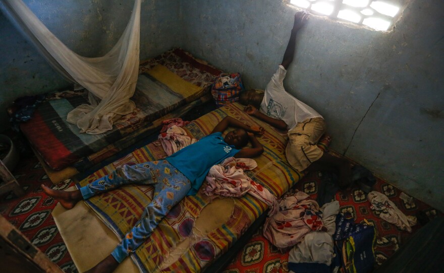 Prince Kaifa, 10, left and his brother Morris, 15, lost their mother to Ebola.