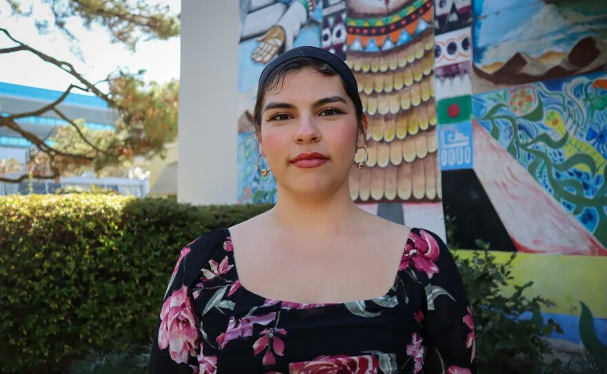 Cal State Sacramento senior Fernanda Arteaga stands by Lassen Hall, where students can access assistance with their financial aid and scholarships, on Jan. 16, 2025. Arteaga, who comes from a mixed-status family, faced difficulties when applying for federal financial aid last year due to glitches on the site.