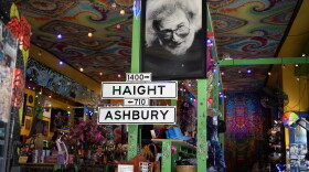 "Love on Haight" is a store on Haight Street in San Francisco that carries a lot of Grateful Dead memorabilia and tie dye clothing as well as a large photo of Jerry Garcia.