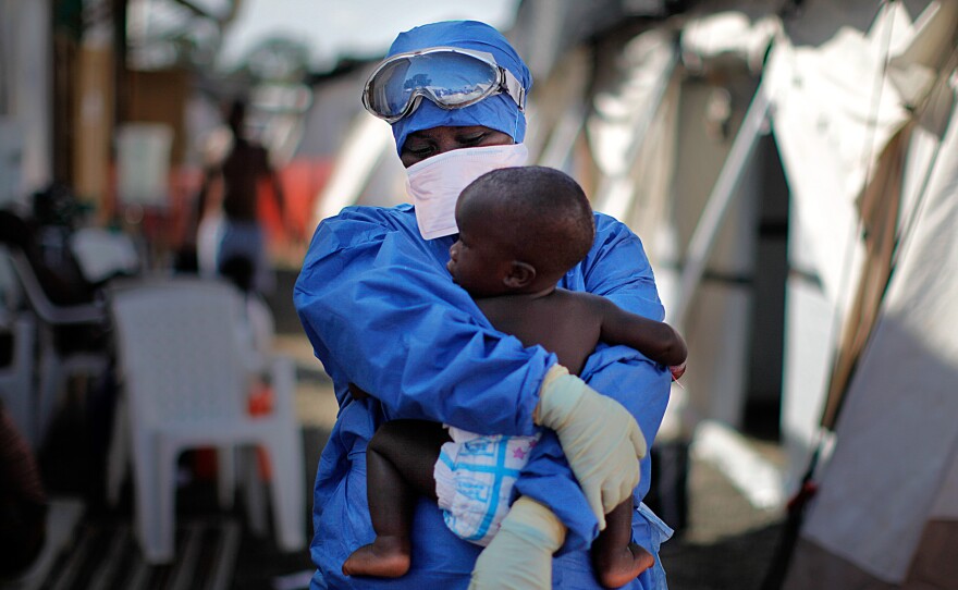 Salome Karwah holds a 10-month-old baby whose parents were treated for Ebola in the Doctors Without Borders center in Monrovia, Liberia. The photo was taken in 2014.