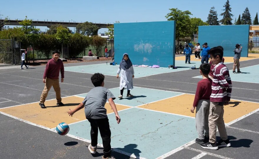 Students from International Community Elementary and Think College Now Elementary play during recess on April 29, 2024 in Oakland, CA. Advocates say millions of children lack outdoor shade at California’s public schools. 