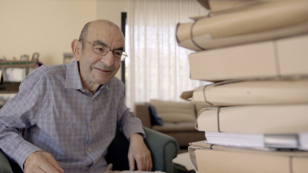 Raja Shehadeh looks at folders from his archive in 2026.