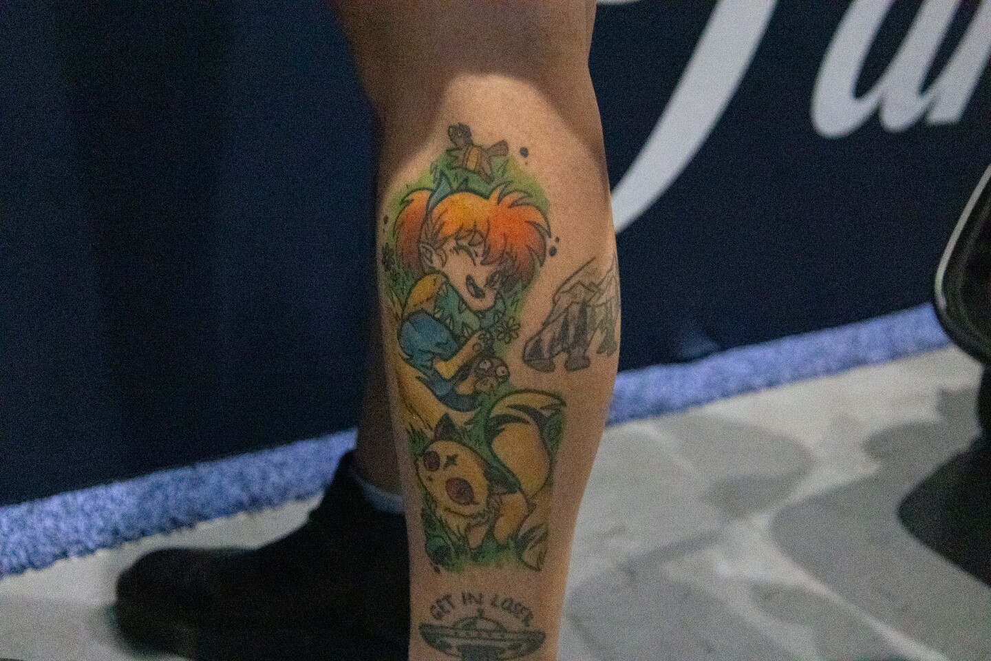 "InuYasha" characters Shippo and Kirara are displayed on an attendee's calf at Comic-Con, July 24, 2026.