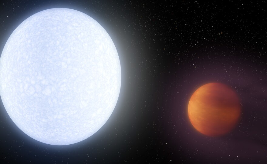 An artist's conception of the KELT-9 system, which has a host star (left) that's almost twice as hot as our sun. The hot star blasts its nearby planet KELT-9b, leading to a dayside surface temperature of around 7,800 degrees Fahrenheit.