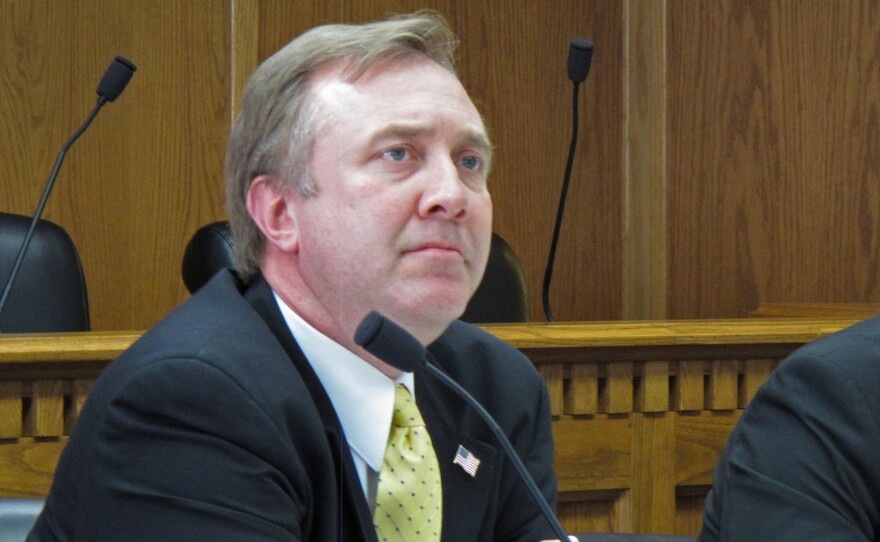 Doug Ericksen, a Washington state senator who is the head of communications for the Trump administration's EPA transition team, listens to testimony during a hearing in Olympia, Wash., in 2013.