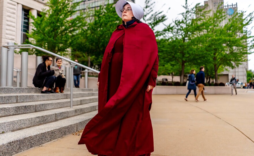 <strong>ST. LOUIS:</strong> Ericka Murphy, of Eureka, attends a demonstration rallying for abortion rights while dressed in a Handmade's Tale costume at the Thomas F. Eagleton U.S. Courthouse in downtown St. Louis.