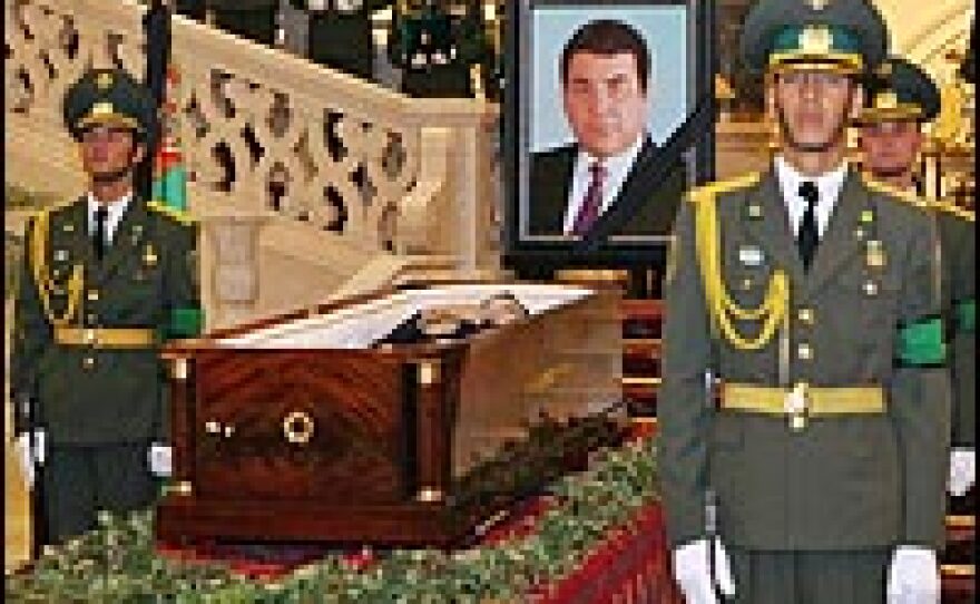 Soldiers stand guard next to the coffin of Turkmenistan President Saparmurat Niyazov in Ashkhabad, Dec. 24, 2006. Thousands of people massed in the Turkmen capital to pay their last respects to the authoritarian leader, who had ruled this Central Asian republic for more than two decades.