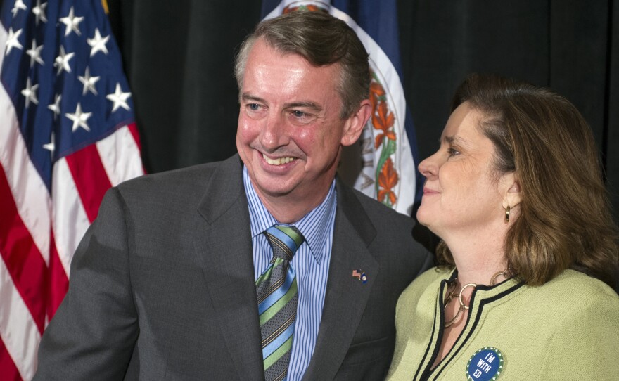 Virginia Republican Senate candidate Ed Gillespie, accompanied by his wife, Cathy, concedes in his Virginia Senate race against the Democratic incumbent, Sen. Mark Warner, on Friday in Springfield, Va.
