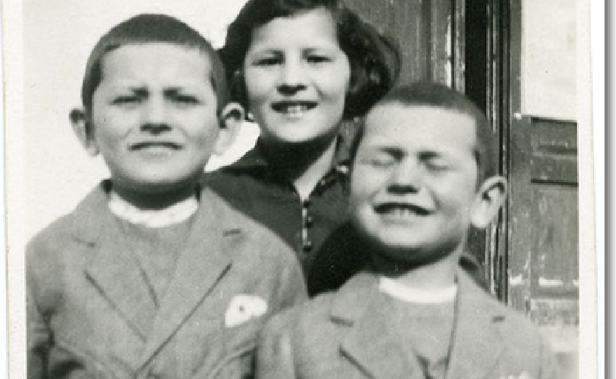Lou (right) is pictured with his sister, Risi and brother, Irving in Yasinia, Ukraine in 1932.