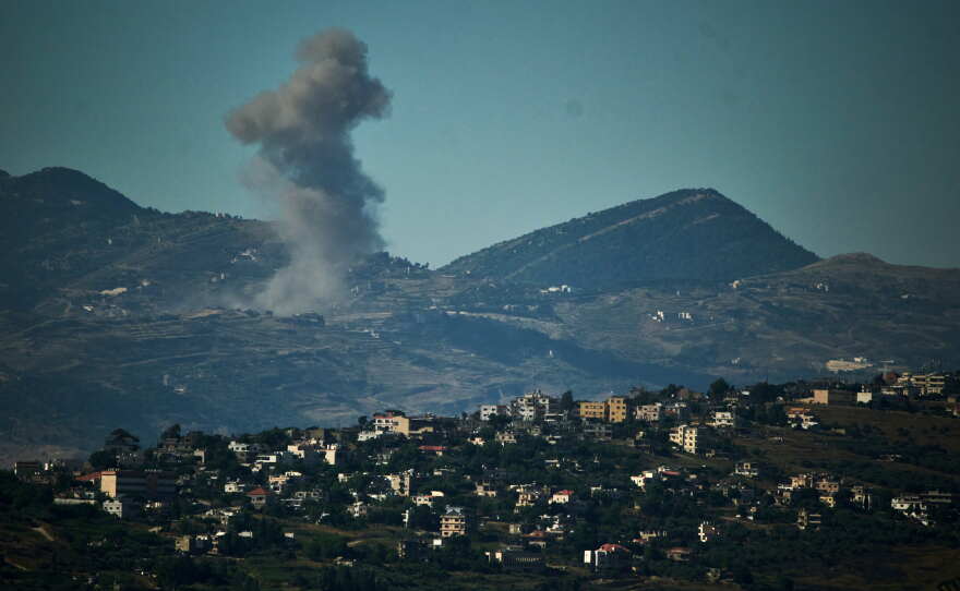 Smoke rises to the sky following an Israeli military strike in southern Lebanon as seen from northern Israel, Friday, June 19, 2026.