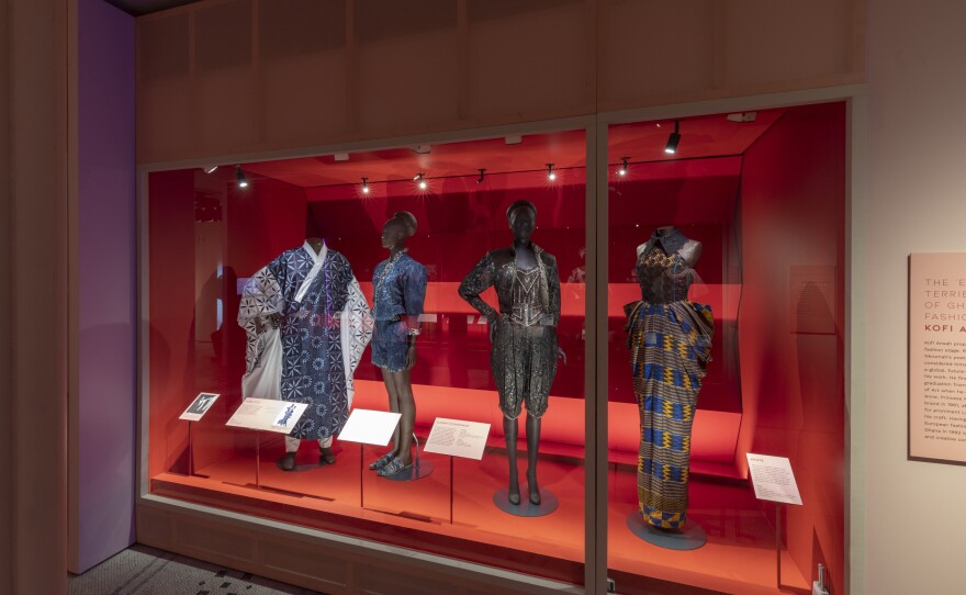 "Luxury" was a guiding principle for Ghana's Kofi Ansah. His sequinned jacket and shorts set with blue and white floral trim is second from left in this lineup of his designs.