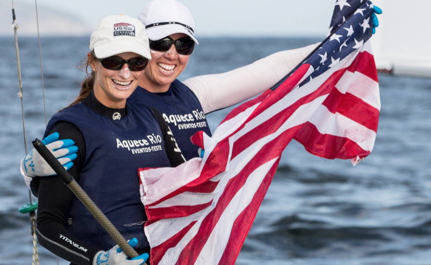 Annie Haeger and Briana Provancha hold the American flag in this undated photo.