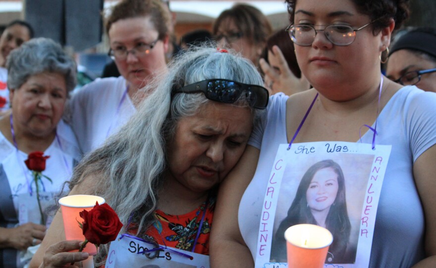 Family and friends of the four slain women gathered for a candlelight vigil at a park in downtown Laredo, Texas, in September. Juan David Ortiz has pleaded not guilty to charges of capital murder.
