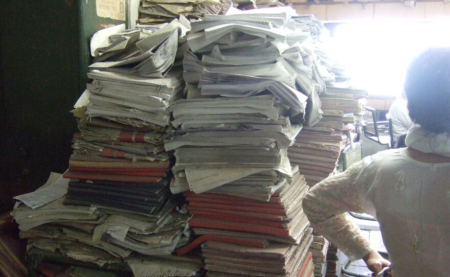 Papers have piled up in a city office in Delhi.