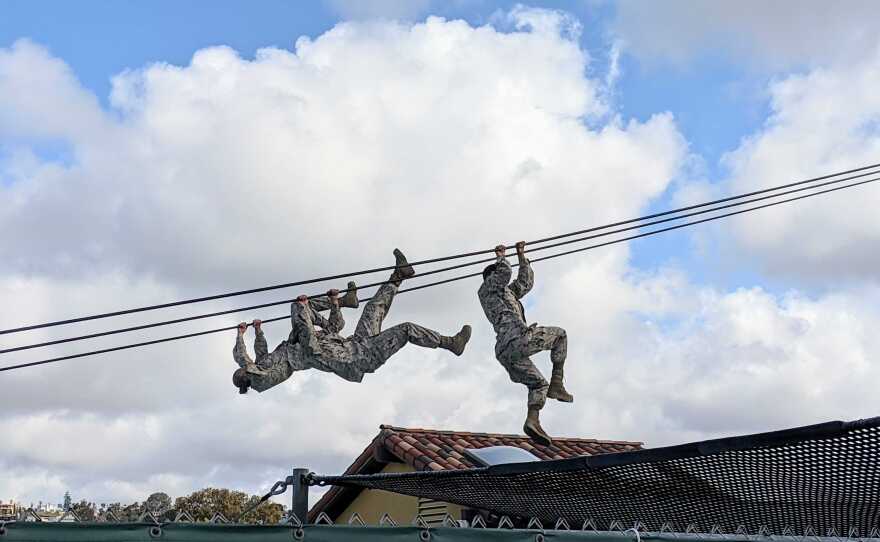 Female Marine recruits on the Slide for Life obstacle course at Marine Recruit Depot, San Diego, March 10, 2021.