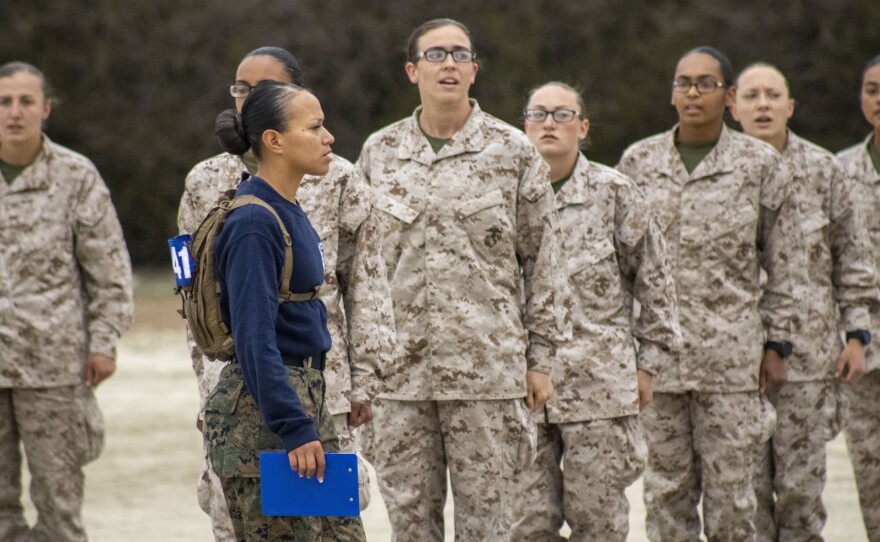 Drill instructor Staff Sgt. Carmen Medinaponce with Marine recruits at Marine Corps Recruit Depot, San Diego, March 8, 2021.