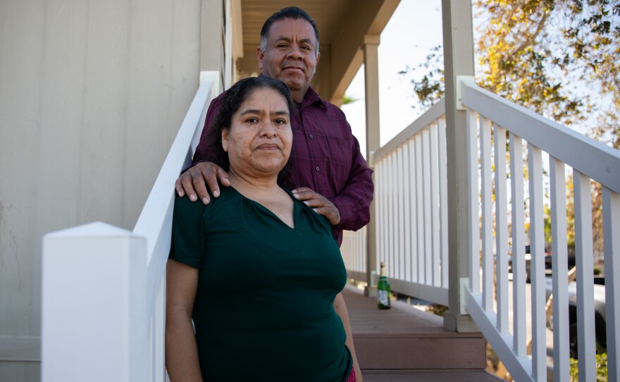 Felipe Aguilar and Domitila Clemente outside their home in Coachella Valley on Aug. 23, 2023.