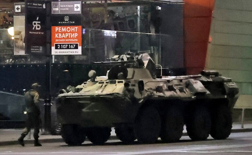 An armored personnel carrier is parked in a street in the city of Rostov-on-Don early Saturday.