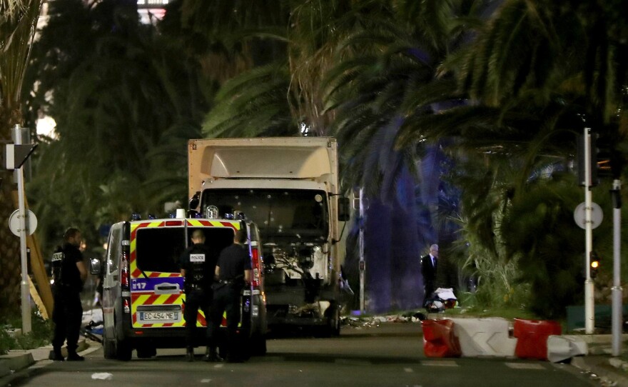 The former mayor of the French city of Nice said dozens of people were killed in the attack Thursday. He urged residents to stay indoors.