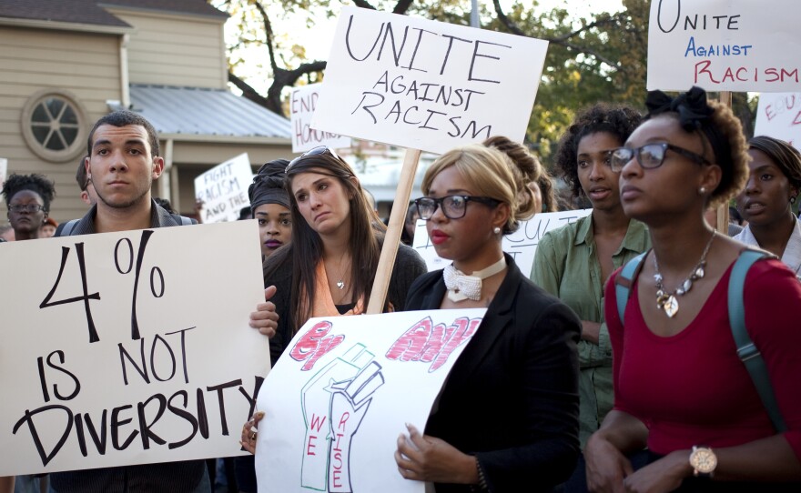 Students rally Oct. 3 in the wake of reports of water balloon attacks on minority students at the University of Texas at Austin. Campus police are investigating the incidents.