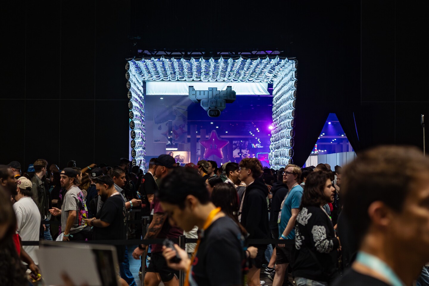 Attendees stream onto the convention floor of TwitchCon at the San Diego Convention Center on Oct. 17, 2025.