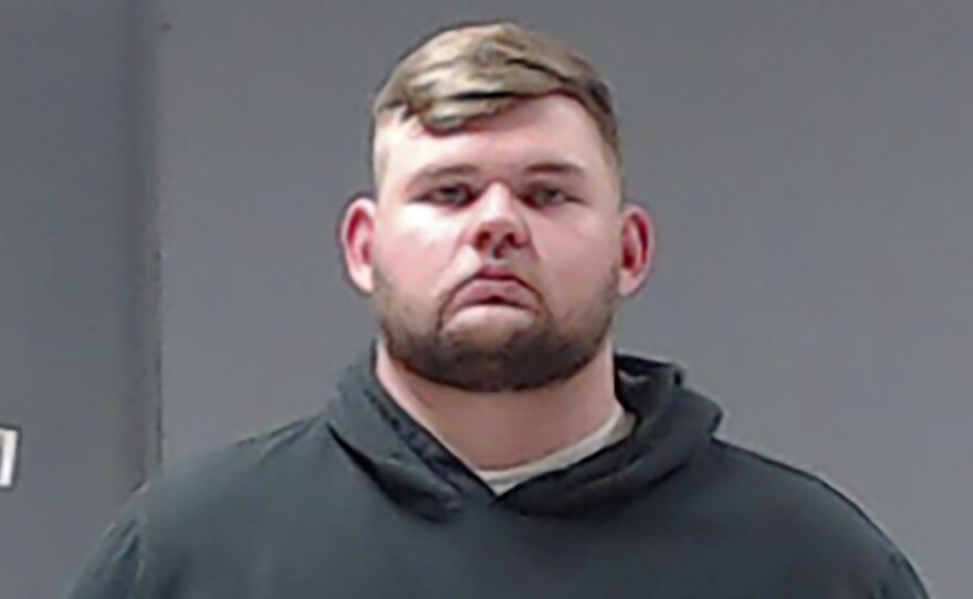 Former Wolfe City Police Officer Shaun Lucas, shown here in a booking photo provided by the Hunt County, Texas Sheriff's Office, has been charged with murder in the fatal shooting of a Black man at a convenience store over the weekend.