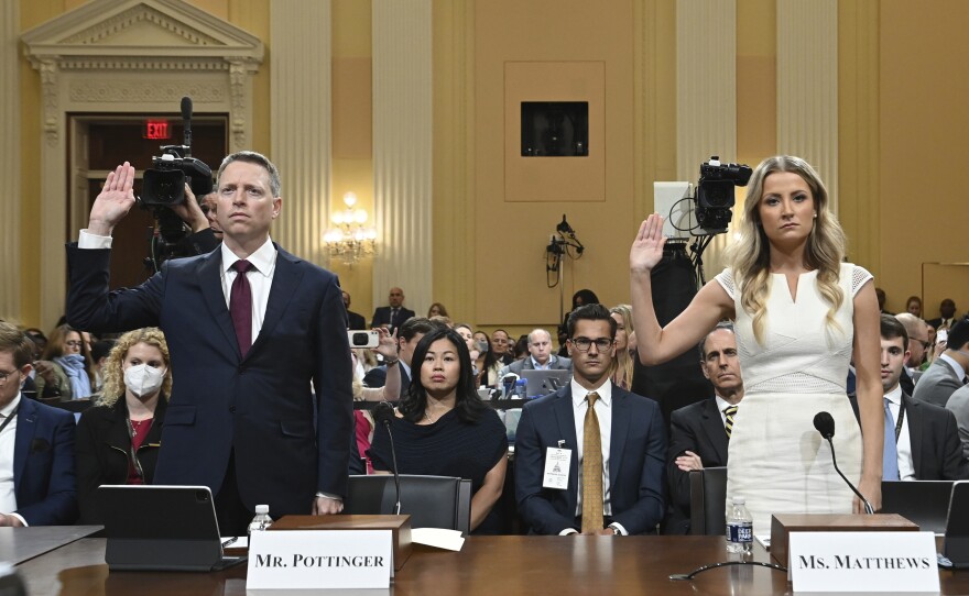 Matt Pottinger, former deputy national security adviser, and Sarah Matthews, former White House deputy press secretary, are sworn in as the House select committee investigating the Jan. 6 attack on the U.S. Capitol holds a hearing on Thursday.