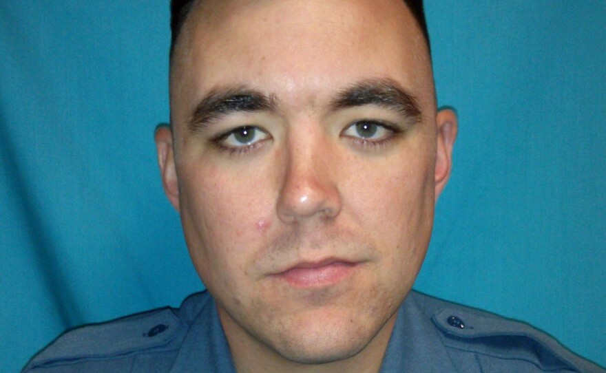 This photo released by the Clinton Police Department shows officer Christopher Ryan Morton, who was fatally shot  while trying to apprehend a suspect after responding to a 911 call at a Missouri residence Tuesday night. Two officers were wounded.